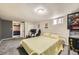 Finished basement featuring carpeted floors and entertainment with gaming equipment and a pinball machine at 8361 Mason Cir, Westminster, CO 80031