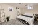 Bedroom featuring carpet, two windows, and minimal decor at 8361 Mason Cir, Westminster, CO 80031