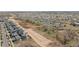 Aerial view of neighborhood with walking paths, new construction and community parks at 19060 E 54Th Pl, Denver, CO 80249