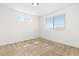 Bright bedroom with two windows providing plenty of natural light at 19060 E 54Th Pl, Denver, CO 80249