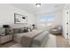 A cozy bedroom with a large bed, neutral tones, and great natural light at 19060 E 54Th Pl, Denver, CO 80249