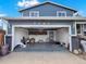 Spacious attached garage offering ample storage and easy access to the home at 7737 S Dover St, Littleton, CO 80128