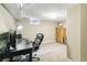 Finished basement featuring a spacious office area, dresser, and neutral carpet at 1060 S Harrison St, Denver, CO 80209