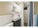 Modern bathroom has stylish vanity, sleek fixtures, and walk-in shower at 1060 S Harrison St, Denver, CO 80209