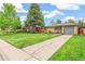 Charming single-story home with a well-kept front yard and inviting curb appeal at 1060 S Harrison St, Denver, CO 80209