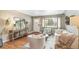 Cozy living room with hardwood floors, a large window, and stylish decor at 1060 S Harrison St, Denver, CO 80209