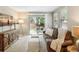 Relaxing living room with natural light and access to the outdoor patio at 1060 S Harrison St, Denver, CO 80209