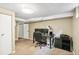 Basement home office features neutral walls and carpet; ready for work and study at 1060 S Harrison St, Denver, CO 80209
