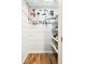 Storage area features painted wood plank walls and organized shelving at 1060 S Harrison St, Denver, CO 80209