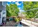 A backyard deck boasts modern furniture and an inviting outdoor space at 1932 Sandhurst Dr, Castle Rock, CO 80104