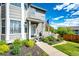 Inviting front porch with manicured landscaping and decorative details at 1932 Sandhurst Dr, Castle Rock, CO 80104
