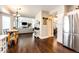 Open-concept living space seamlessly connected to a modern kitchen, perfect for entertaining at 1932 Sandhurst Dr, Castle Rock, CO 80104