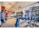Bright gym offering a variety of cardio and strength training machines, plus punching bags, for a complete workout at 20 Wilcox St # 518, Castle Rock, CO 80104