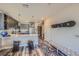 Charming kitchen with modern gray cabinetry, stainless appliances, and a view of the home's unique decor at 20 Wilcox St # 518, Castle Rock, CO 80104
