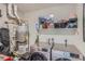 Practical laundry area equipped with modern washer, dryer, and storage shelving at 20 Wilcox St # 518, Castle Rock, CO 80104