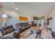 Inviting living room features modern decor, comfortable seating, and an open floor plan with hardwood floors at 20 Wilcox St # 518, Castle Rock, CO 80104