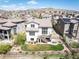 A backyard with a deck, patio, and lawn, in a Gathering-friendly community at 15194 W Washburn Ave, Lakewood, CO 80228
