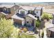 A well-maintained front exterior with stone accents and a two-car garage at 15194 W Washburn Ave, Lakewood, CO 80228