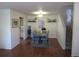 Bright dining room with a modern table set, stylish decor, and easy access to the kitchen at 569 Alton Way # E, Denver, CO 80230
