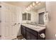 Spacious bathroom with a double sink vanity, ample lighting and great storage at 16057 E 47Th Pl, Denver, CO 80239
