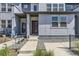 Inviting front entrance with well-maintained landscaping and a clear path to the front door at 16057 E 47Th Pl, Denver, CO 80239