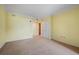 Bright, carpeted bedroom with a large open space and natural light at 8100 E Union Ave # 614, Denver, CO 80237