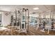 Well-equipped fitness center with state-of-the-art weight machines, cardio equipment, and mirrored walls at 8100 E Union Ave # 614, Denver, CO 80237