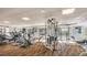 Bright and airy fitness center featuring treadmills, ellipticals, stationary bikes, and weight machines at 8100 E Union Ave # 614, Denver, CO 80237