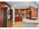 Kitchen with wood cabinets, countertops, and stainless steel appliances at 8100 E Union Ave # 614, Denver, CO 80237