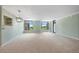 Spacious living room with large windows allowing natural light at 8100 E Union Ave # 614, Denver, CO 80237