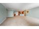 Open-concept living room with a view of the kitchen and ample space for entertaining at 8100 E Union Ave # 614, Denver, CO 80237