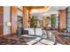 Elegant lobby with stylish seating areas, lush greenery, and contemporary design at 8100 E Union Ave # 614, Denver, CO 80237