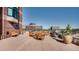 Expansive roof deck with barbecue and seating, boasting panoramic views of surrounding city buildings at 8100 E Union Ave # 614, Denver, CO 80237