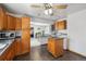Functional kitchen area with an island, washer/dryer, and an open layout at 1995 Xenia St, Denver, CO 80220