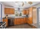 Spacious kitchen with stainless steel appliances, ample cabinet space, and a window view at 1995 Xenia St, Denver, CO 80220