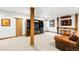 Finished basement with media center, bar, and leather chairs at 451 W 152Nd Ave, Broomfield, CO 80023