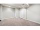 Finished basement area with carpeted floors, white walls and trim, with recessed lighting at 451 W 152Nd Ave, Broomfield, CO 80023