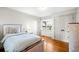 Bedroom featuring natural light, hardwood floors, and neutral color palette at 451 W 152Nd Ave, Broomfield, CO 80023