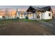 Exterior view of the home highlighting the outdoor area with a pergola, perfect for entertaining or relaxing in style at 451 W 152Nd Ave, Broomfield, CO 80023