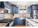Updated kitchen features granite countertops, stainless steel appliances, and custom cabinets at 451 W 152Nd Ave, Broomfield, CO 80023
