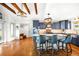Stylish kitchen with blue cabinets, granite countertops, and modern lighting, perfect for cooking and entertaining guests at 451 W 152Nd Ave, Broomfield, CO 80023