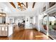Open concept space with kitchen, dining and living areas seamlessly integrated, creating a spacious and inviting atmosphere at 451 W 152Nd Ave, Broomfield, CO 80023