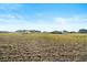 Vast, well-maintained acreage with a modern farmhouse and barn under a bright, clear sky at 451 W 152Nd Ave, Broomfield, CO 80023