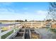 Gravel-lined yard with raised garden beds and fenced perimeter at 451 W 152Nd Ave, Broomfield, CO 80023