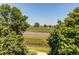 Great view from the property overlooking trees, open fields, and a small body of water at 804 Summer Hawk Dr # 3202, Longmont, CO 80504