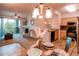 Inviting living room with a fireplace and a balcony overlooking the outdoor scenery at 804 Summer Hawk Dr # 3202, Longmont, CO 80504