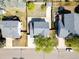 Overhead shot of a home showcasing the backyard, driveway, and proximity to neighboring houses at 524 Rider Ridge Dr, Longmont, CO 80504