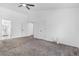 Large main bedroom featuring vaulted ceilings, double doors, and neutral decor for a peaceful retreat at 524 Rider Ridge Dr, Longmont, CO 80504
