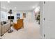 Basement with a seating area, TV, and neutral decor for a cozy and inviting space at 1140 S Sherman St, Denver, CO 80210