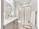 Clean bathroom with a sleek vanity, glass-enclosed shower, and modern fixtures at 1140 S Sherman St, Denver, CO 80210